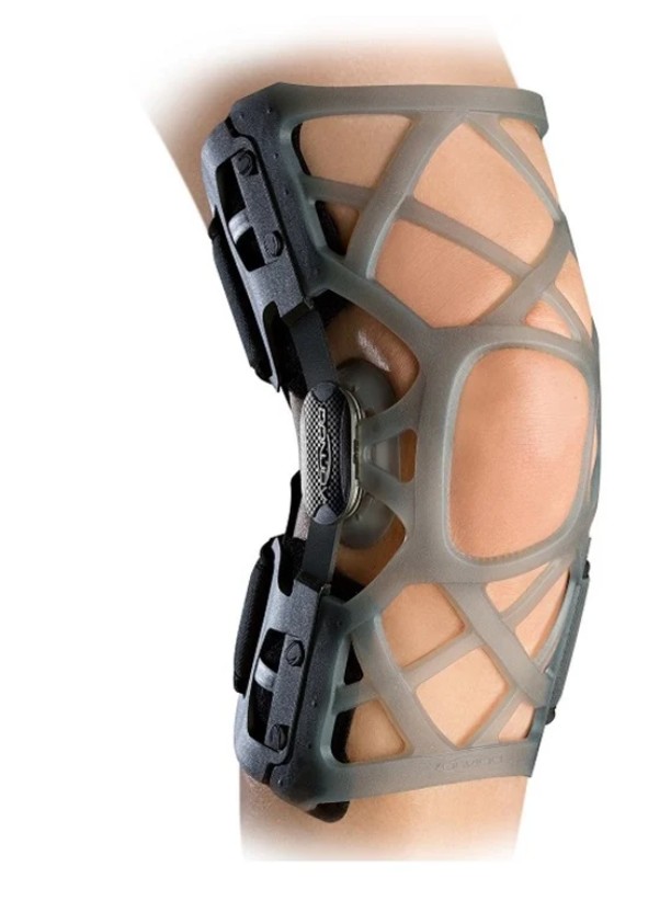 Genouillère d'arthrose à décharge — armature ajourée